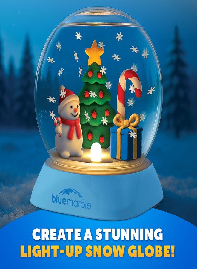 Blue Marble مجموعة كرة ثلجية مضيئة زرقاء اللون للأطفال - اصنع مشهدًا احتفاليًا باستخدام الصلصال، وقطع ندفات الثلج، وشخصية رجل الثلج، ومجموعة كرة ثلجية بلاستيكية، وأشغال يدوية لعيد الميلاد للأطفال، وهدايا صغيرة للجوارب - Image 2